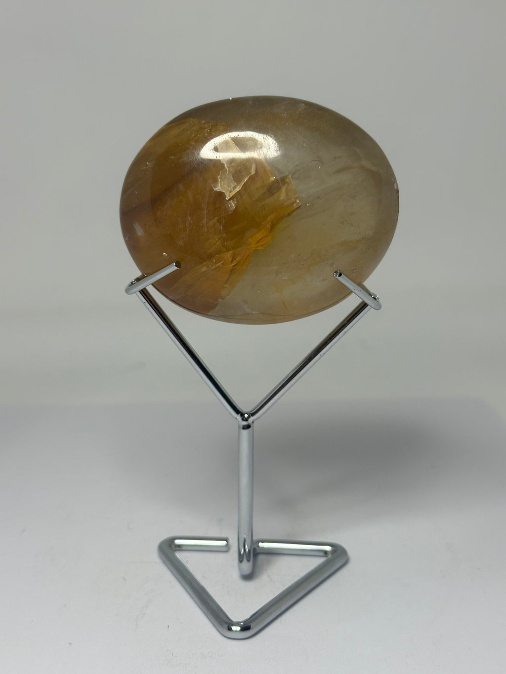 Golden Healer Palm Stone on Stand – 195g