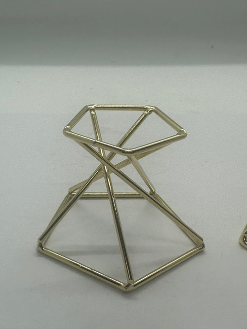Golden metal sphere holder, shown from another angle