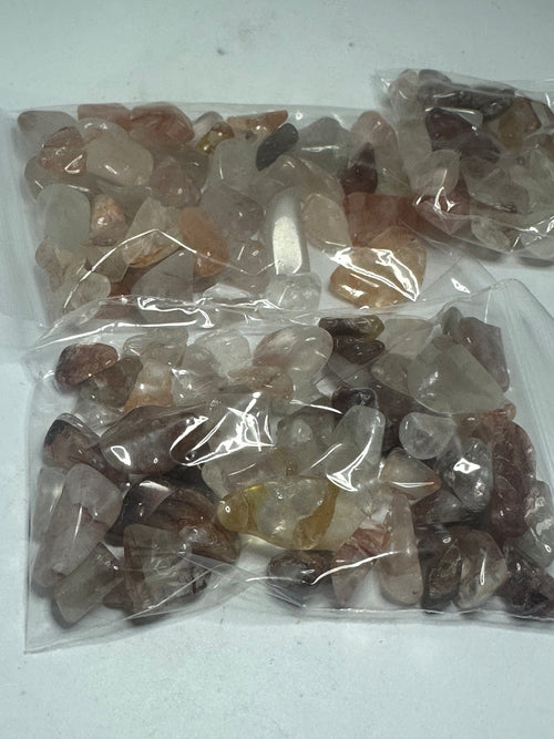Tumbled fire quartz chips, 100g, shown from another angle