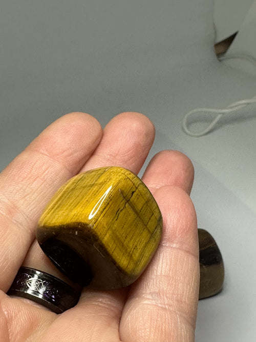Polished tiger's eye cube, 40g, shown from another angle