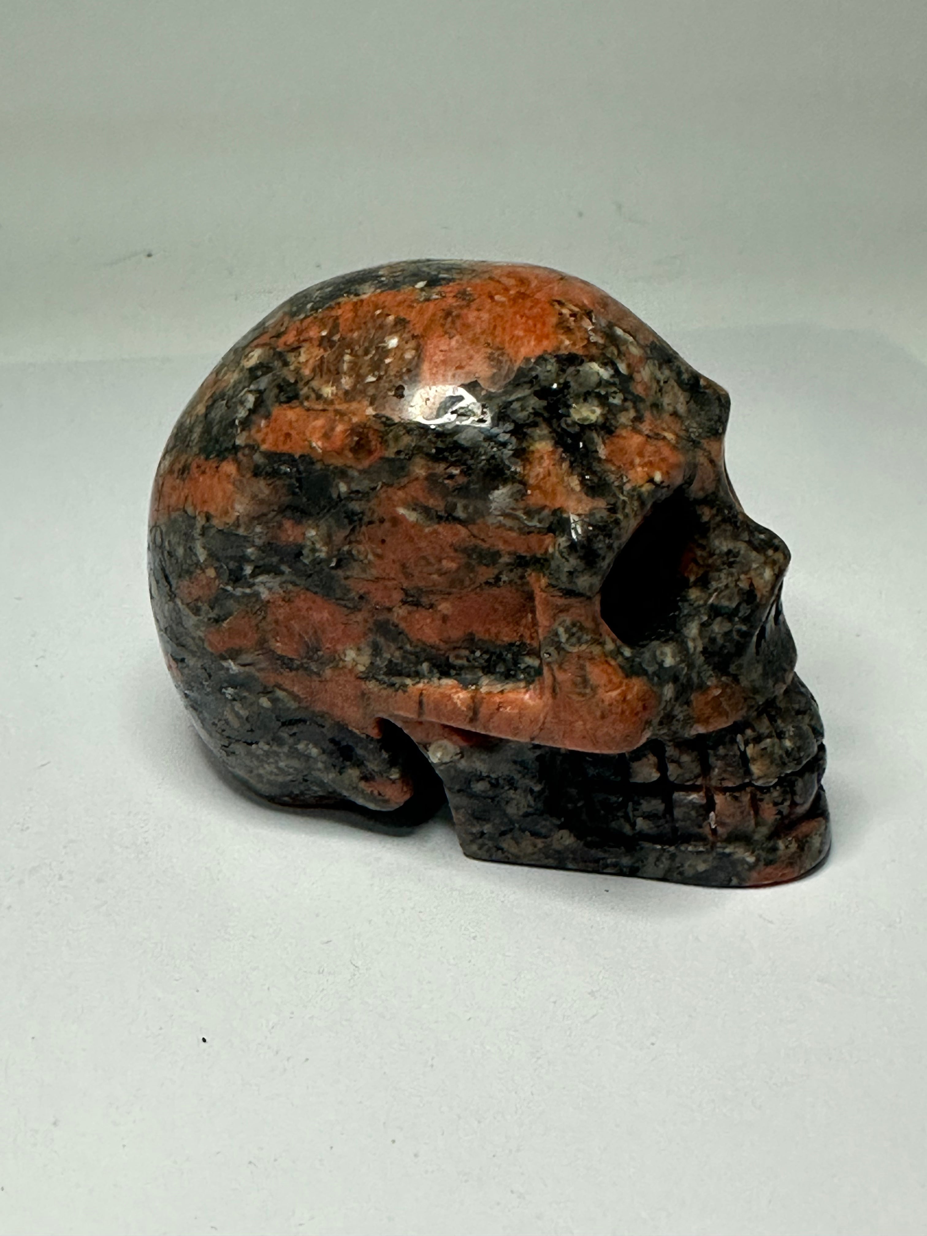 Red Que Sera Skull Carving