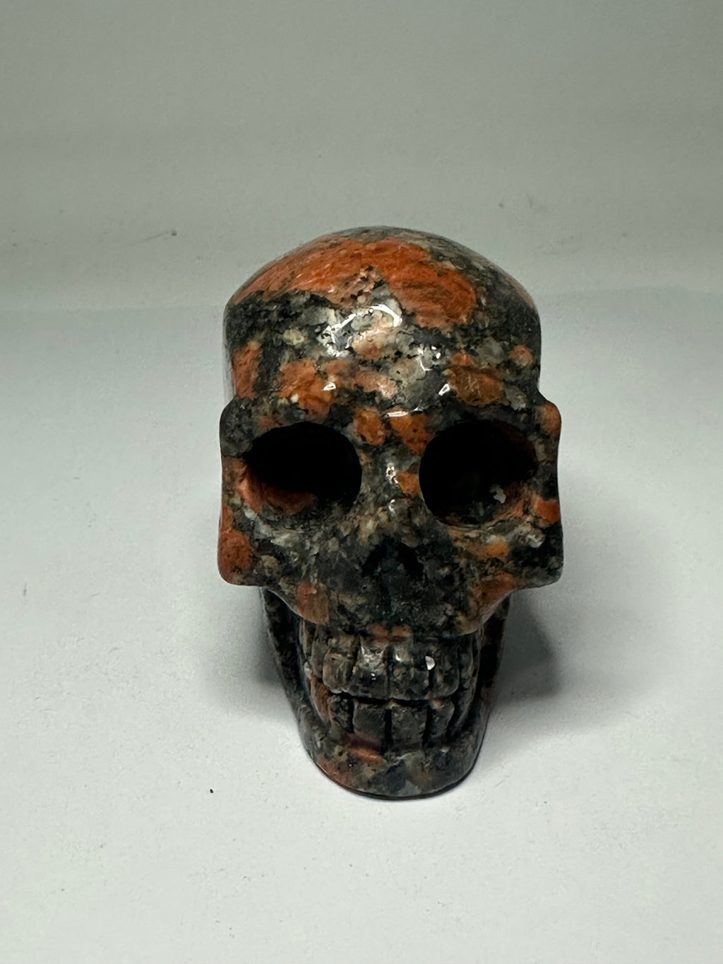 Red Que Sera Skull Carving
