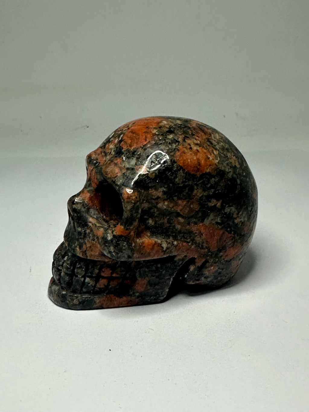 Red Que Sera Skull Carving
