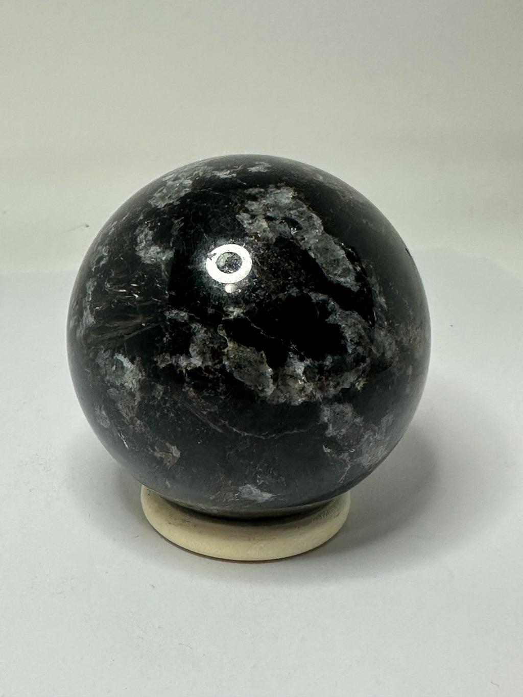Astrophyllite Sphere with Garnet Inclusions – 467g