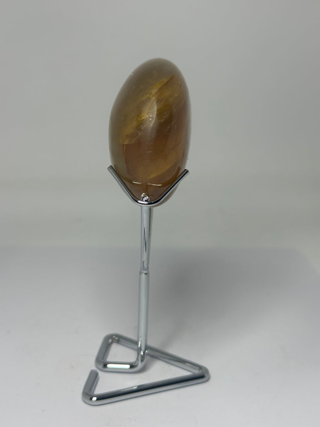 Golden Healer Palm Stone on Stand – 195g