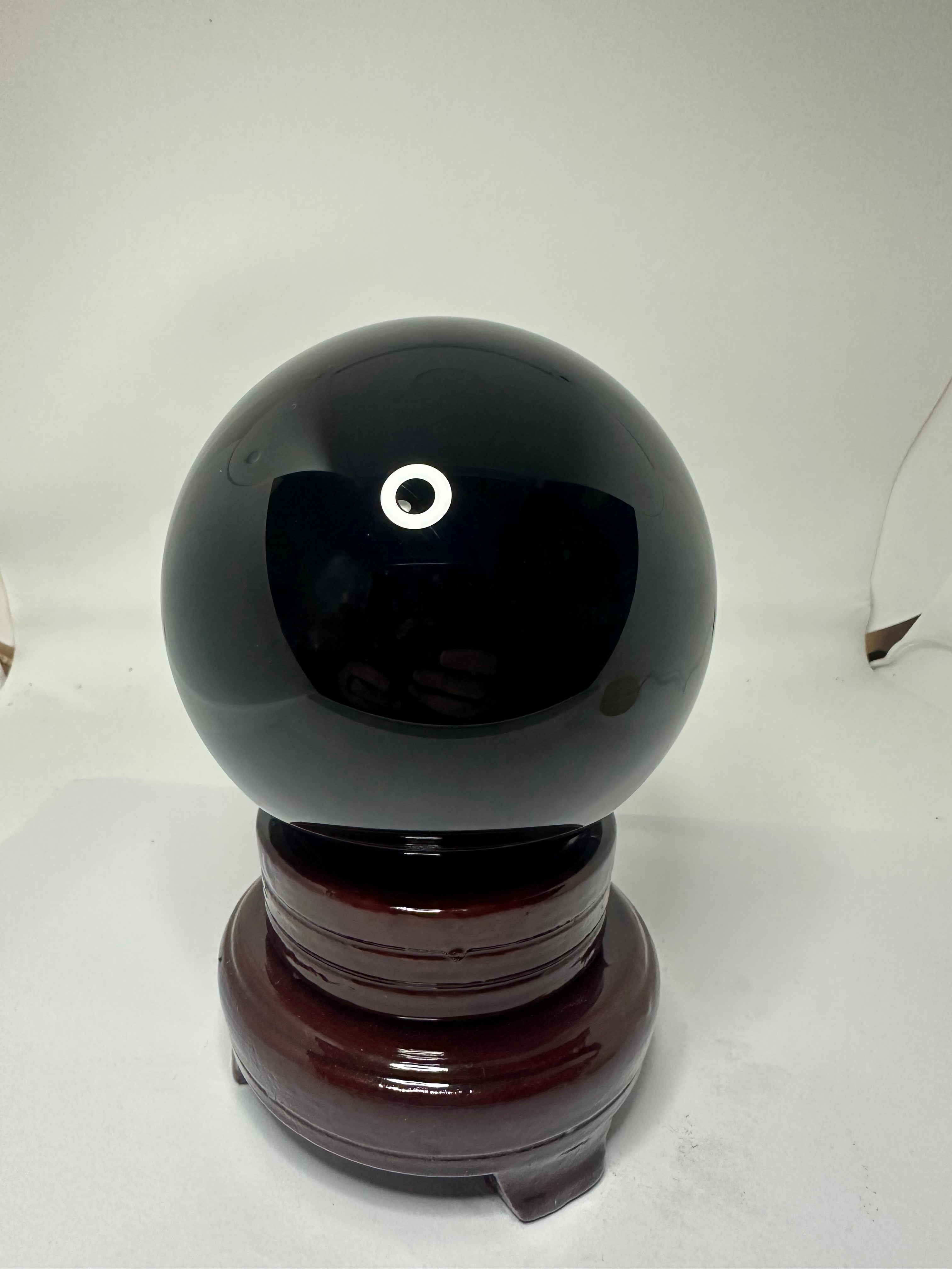 Polished black obsidian sphere, 95mm and 1.24kg